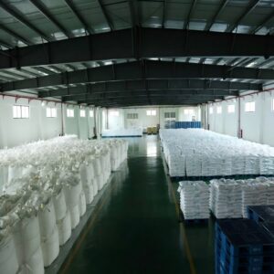 Large warehouse storing bulk bags of phosphate products on pallets